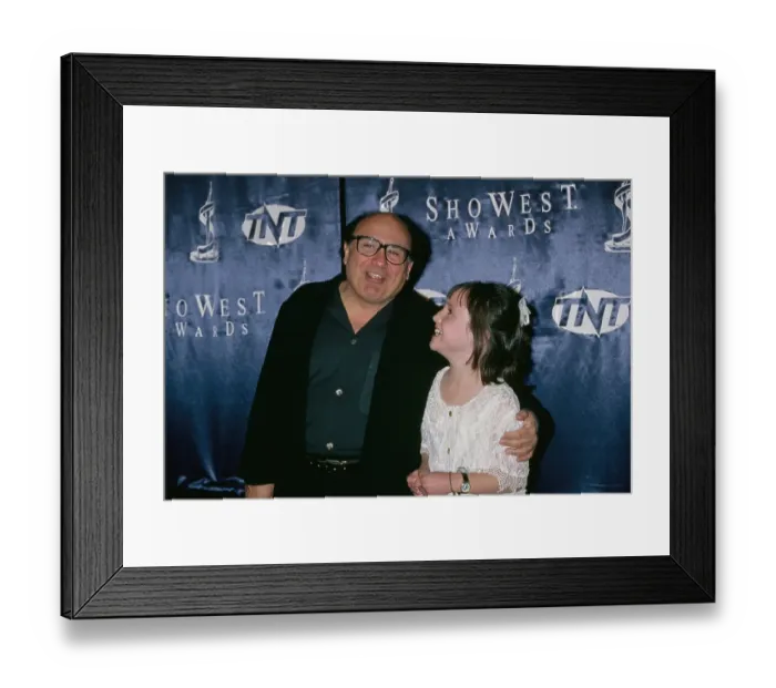 Framed Print : Danny DeVito And Mara Wilson Attend 1997 ShoWest Awards