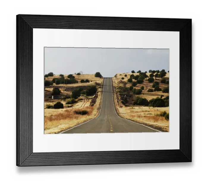 Framed Print : The famous road, Route 66, stretches across the Arizona desert near Seligman, NM