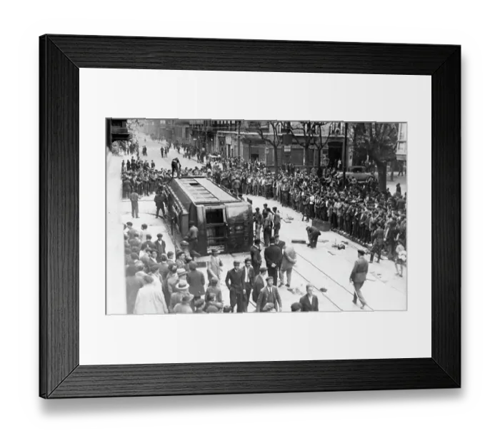 Framed Print : RAIL CAR. A view as a rail car tipped over in the streets of San Sebastian, Spain Framed Print : RAIL CAR. A view as a rail car tipped over in the streets of San Sebastian, Spain