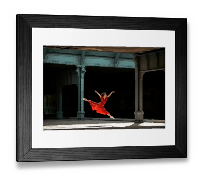 Framed Print : Female ballet dancer dancing with pointes in the street with a long red dress Framed Print : Female ballet dancer dancing with pointes in the street with a long red dress