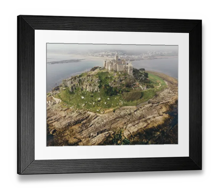 Framed Print : Rocky footpath connects St Michael Mountain with mainland in Mount's Bay, Cornwall, England. June 02, 2021