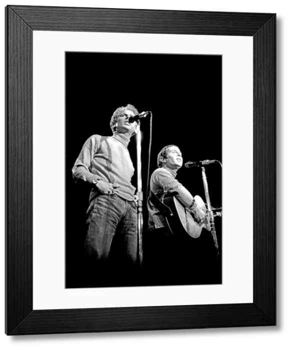 Framed Print : PAUL SIMON & ART GARFUNKLE PERFORMING AT THE MONTEREY INTERNATIONAL POP FESTIVAL Framed Print : PAUL SIMON & ART GARFUNKLE PERFORMING AT THE MONTEREY INTERNATIONAL POP FESTIVAL