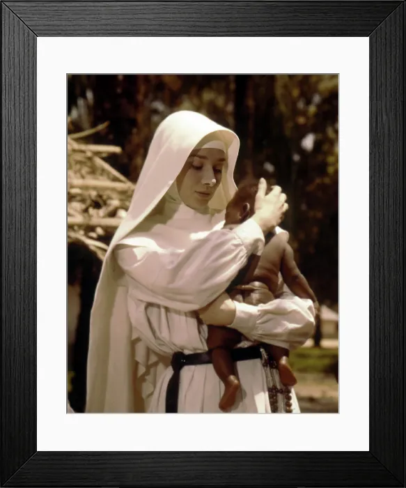 Framed Print : Audrey Hepburn With Baby Framed Print : Audrey Hepburn With Baby