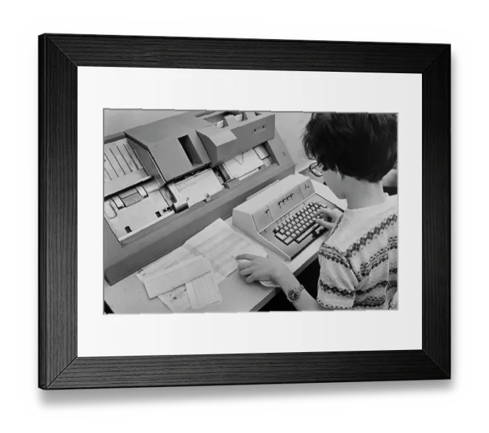 Framed Print : Woman Using Card Punch Framed Print : Woman Using Card Punch