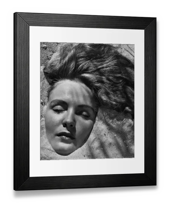 Framed Print : Meredith. The face of a woman, named as Meredith, partially buried in sand, circa 1950 Framed Print : Meredith. The face of a woman, named as Meredith, partially buried in sand, circa 1950