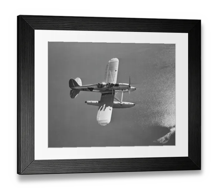 Framed Print : Floatplane Over Water