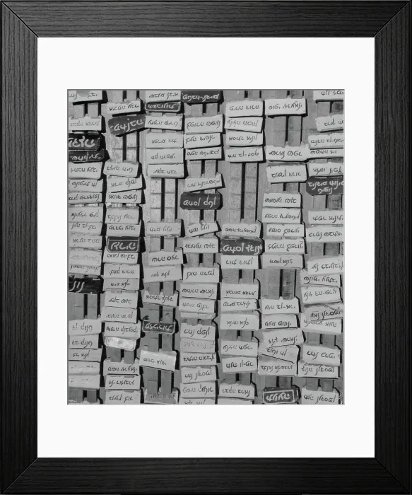 Framed Print : Israel. Hundreds of Hebrew names written on to pieces of paper