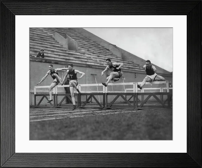 Framed Print : Hurdling. Four athletes compete in a hurdles event, circa 1925 Framed Print : Hurdling. Four athletes compete in a hurdles event, circa 1925
