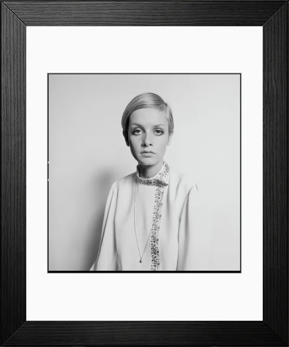 Framed Print : Twiggy. English singer, actress, and fashion model Twiggy sits for a portrait in 1967 Framed Print : Twiggy. English singer, actress, and fashion model Twiggy sits for a portrait in 1967