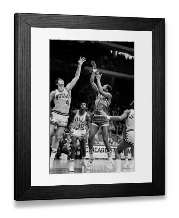 Framed Print : Earl Monroe of the New York Knicks guards Norm Van Lier of the Chicago Bulls in the 1974-1975 season at the Chicago Stadium in Chicago, Il