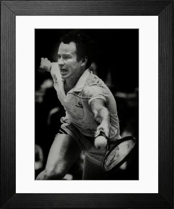 Framed Print : John McEnroe Returns During A Match Framed Print : John McEnroe Returns During A Match