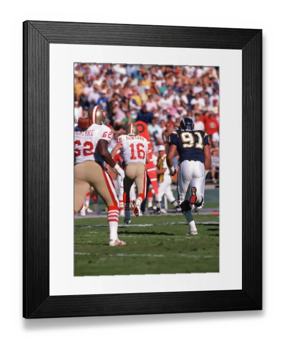 Framed Print : NFL San Francisco 49ers - QB # 16 Joe Montana, RD # 62 Guy McIntyre and S.D. Charger DE # 91 Leslie O'Neal Framed Print : NFL San Francisco 49ers - QB # 16 Joe Montana, RD # 62 Guy McIntyre and S.D. Charger DE # 91 Leslie O'Neal