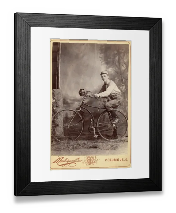 Framed Print : Historical cabinet card portrait of teenage boy on bike in studio Framed Print : Historical cabinet card portrait of teenage boy on bike in studio