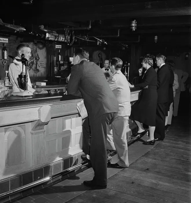 Framed Print : 21 Club. Customers standing at the bar in the 21 Club, restaurant Framed Print : 21 Club. Customers standing at the bar in the 21 Club, restaurant