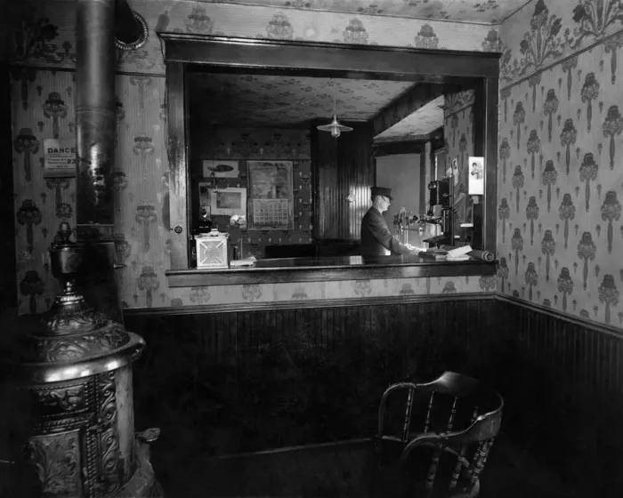 Framed Print : 521, adult, antique, black & white, caucasian, clerk, historical, hotel, indoor, male Framed Print : 521, adult, antique, black & white, caucasian, clerk, historical, hotel, indoor, male