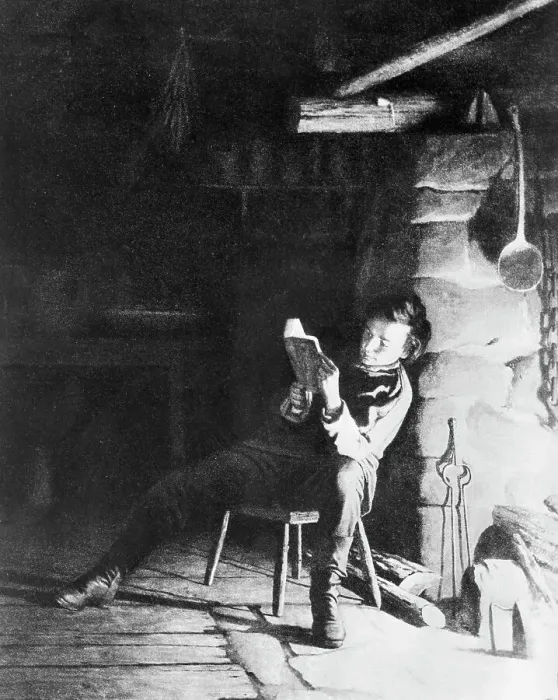 Framed Print : Abraham Lincoln as A Young Man Reading Near Fireplace Framed Print : Abraham Lincoln as A Young Man Reading Near Fireplace