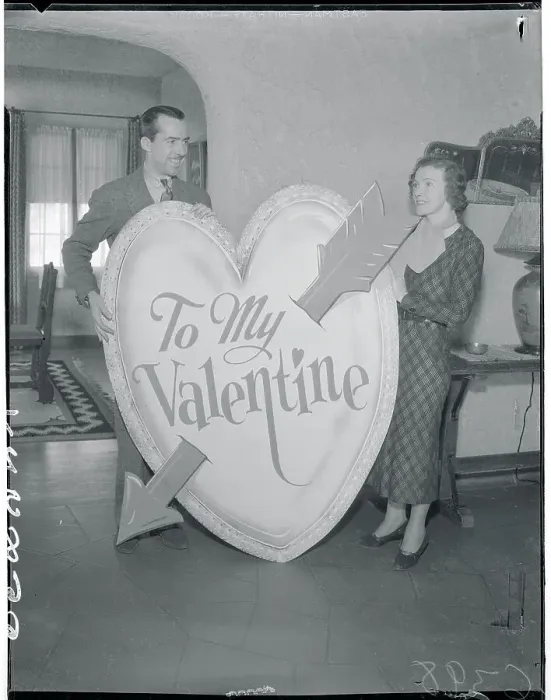 Framed Print : Actor Bradley Page Giving Large Valentine to His Wife