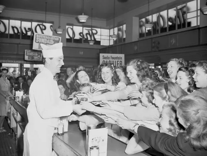 Framed Print : Actor Dana Andrews Serving Sodas to Fans Framed Print : Actor Dana Andrews Serving Sodas to Fans