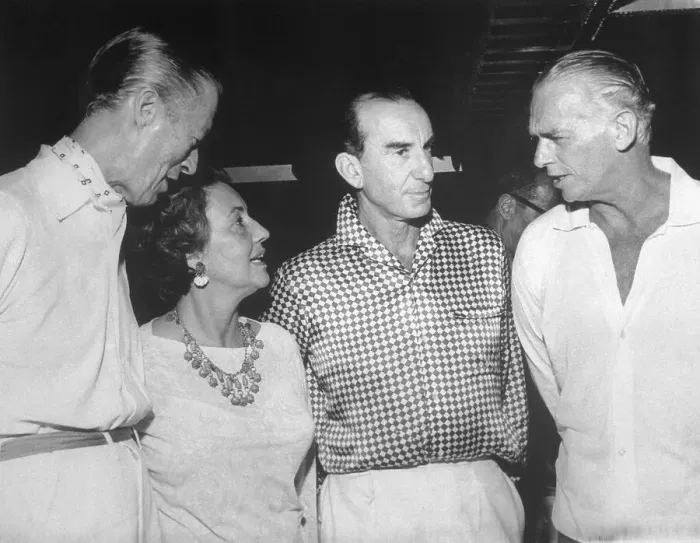 Framed Print : Actor Douglas Fairbanks Jr. and Wife Conversing at Emilio Pucci Party Framed Print : Actor Douglas Fairbanks Jr. and Wife Conversing at Emilio Pucci Party