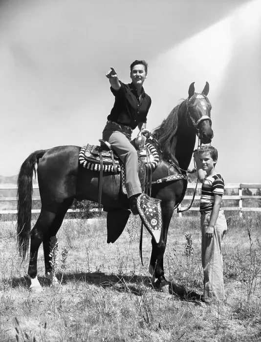 Framed Print : Actor Errol Flynn and Son While Horseback Riding Framed Print : Actor Errol Flynn and Son While Horseback Riding