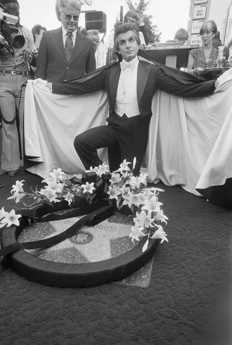 Framed Print : Actor George Hamilton Places Wreath on Bela Lugosi's Star Framed Print : Actor George Hamilton Places Wreath on Bela Lugosi's Star