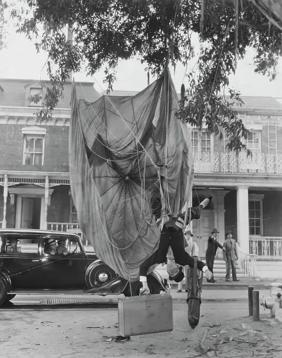 Framed Print : Actor Harold Lloyd Hanging from a Parachute Outdoors Framed Print : Actor Harold Lloyd Hanging from a Parachute Outdoors