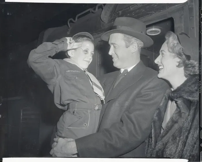 Framed Print : Actor James Stewart Holding Young Boy with Mrs. Stewart Nearby Framed Print : Actor James Stewart Holding Young Boy with Mrs. Stewart Nearby