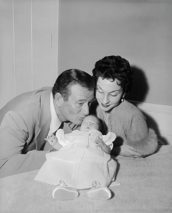 Framed Print : Actor John Wayne with His Wife and Newborn Framed Print : Actor John Wayne with His Wife and Newborn