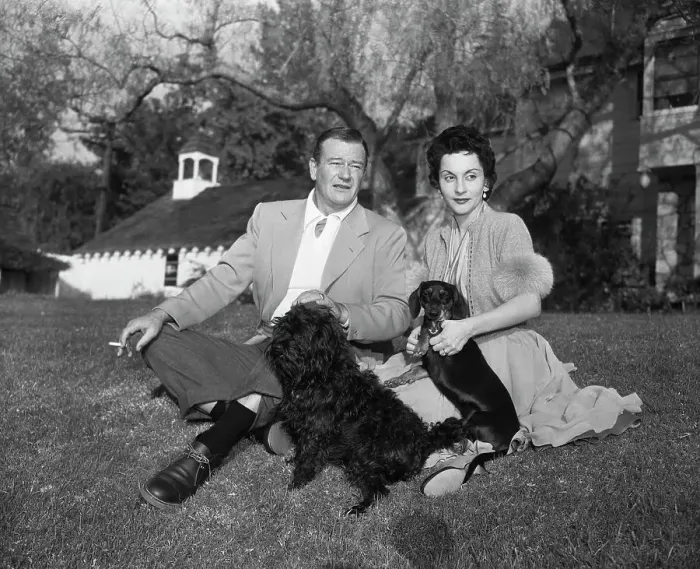Framed Print : Actor John Wayne and Wife Pilar Wayne Framed Print : Actor John Wayne and Wife Pilar Wayne
