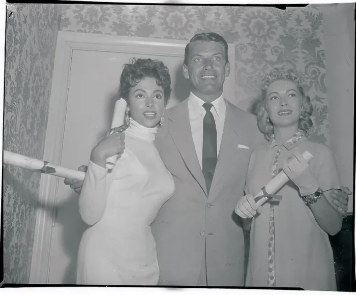 Framed Print : Actor Richard Egan Posing with Female Peers