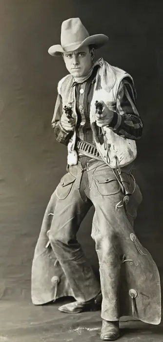 Framed Print : Actor Roy Stewart in Cowboy Attire Holding Revolvers Framed Print : Actor Roy Stewart in Cowboy Attire Holding Revolvers