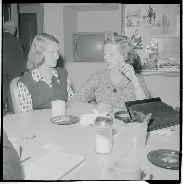 Framed Print : Actress Bette Davis and Daughter Sitting at Table Together