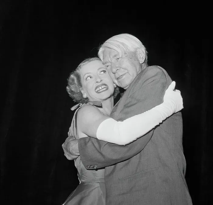 Framed Print : Actress Bette Davis Hugging Writer Carl Sandburg Framed Print : Actress Bette Davis Hugging Writer Carl Sandburg