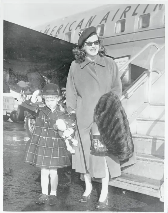 Framed Print : Actress Bette Davis Pausing With Daughter Near Airplane Framed Print : Actress Bette Davis Pausing With Daughter Near Airplane