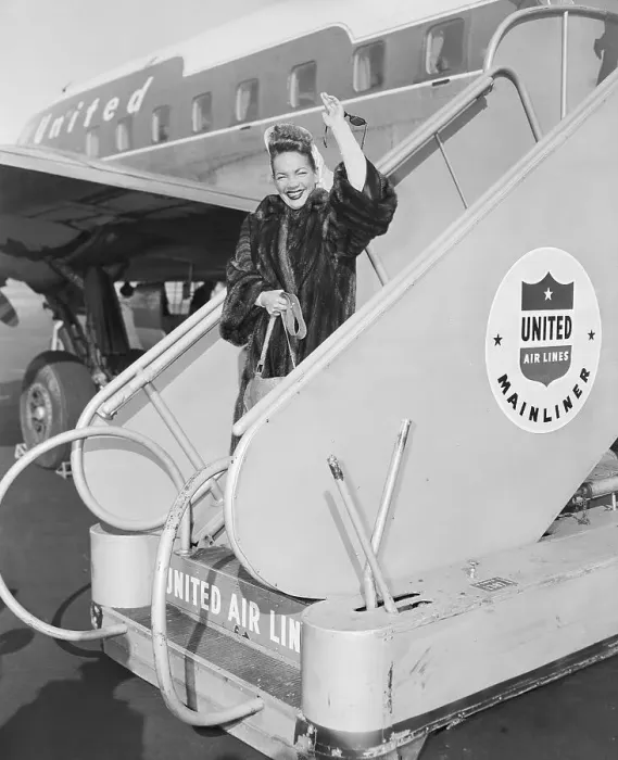 Framed Print : Actress Carmen Miranda Arriving at Airport Framed Print : Actress Carmen Miranda Arriving at Airport