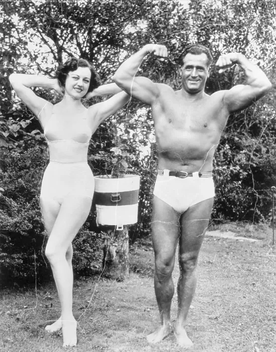 Framed Print : Actress Dorothy Wilson Posing with Charles Atlas Framed Print : Actress Dorothy Wilson Posing with Charles Atlas
