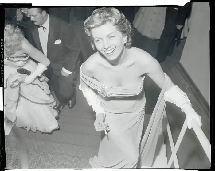 Framed Print : Actress Erica Beer Pausing on Staircase Framed Print : Actress Erica Beer Pausing on Staircase