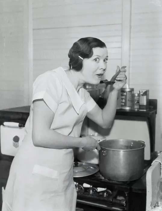 Framed Print : Actress Fritzie Ridgeway Tasting Food from Pot Framed Print : Actress Fritzie Ridgeway Tasting Food from Pot
