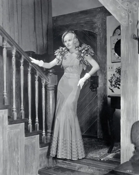 Framed Print : Actress Jean Harlow in Formal Dress Posing by Staircase