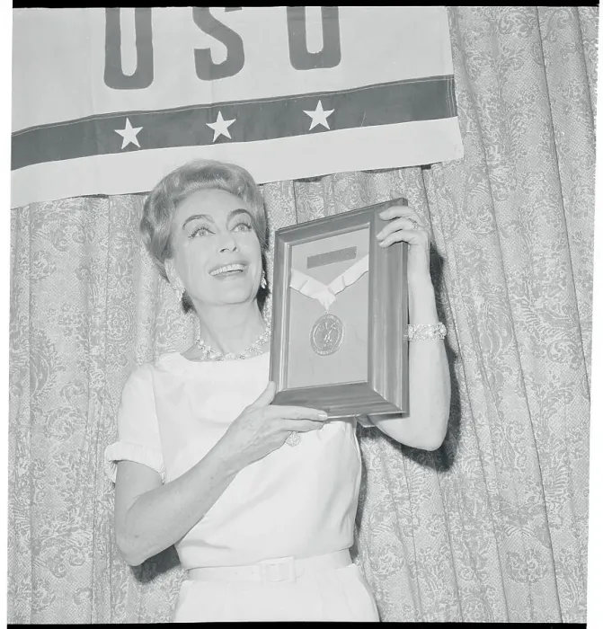 Framed Print : Actress Joan Crawford Holding Woman of the Year Trophy Framed Print : Actress Joan Crawford Holding Woman of the Year Trophy