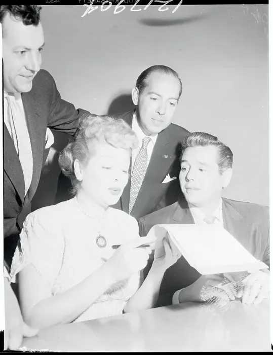 Framed Print : Actress Lucille Ball and Desi Arnaz Examining Advertisement Contract Framed Print : Actress Lucille Ball and Desi Arnaz Examining Advertisement Contract