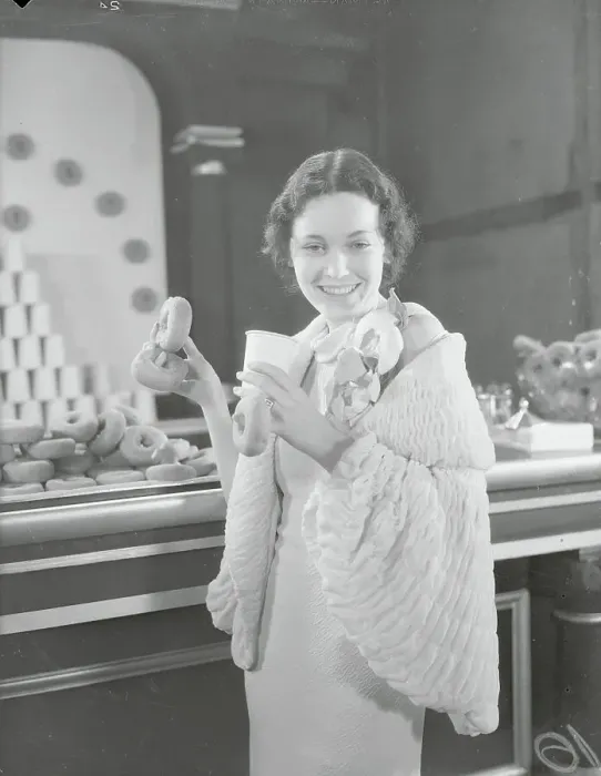 Framed Print : Actress Maureen O'Sullivan with Donut Display Framed Print : Actress Maureen O'Sullivan with Donut Display