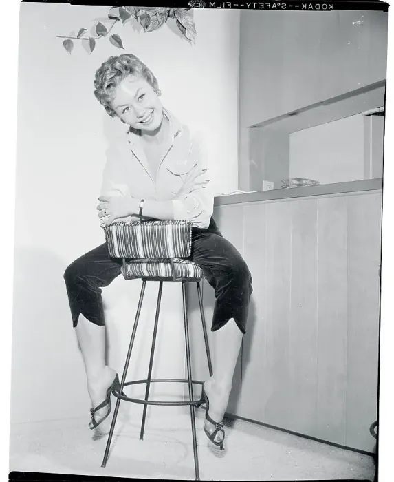 Framed Print : Actress Mitzi Gaynor Posing on Stool Framed Print : Actress Mitzi Gaynor Posing on Stool