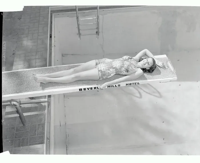 Framed Print : Actress Rita Hayworth Sunning Herself on Diving Board Framed Print : Actress Rita Hayworth Sunning Herself on Diving Board