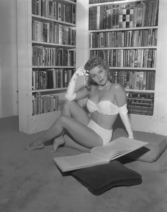 Framed Print : Actress Sally Forrest Posing on Floor Near Bookshelf Framed Print : Actress Sally Forrest Posing on Floor Near Bookshelf