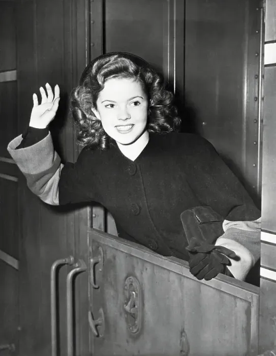 Framed Print : Actress Shirley Temple Waving from Train Framed Print : Actress Shirley Temple Waving from Train