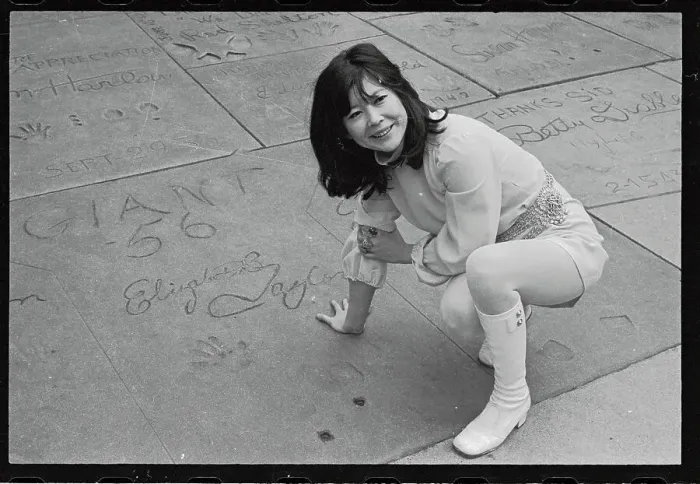 Framed Print : Actress Tsai Chin Stooping and Examining Prints on Hollywood Sidewalk Framed Print : Actress Tsai Chin Stooping and Examining Prints on Hollywood Sidewalk