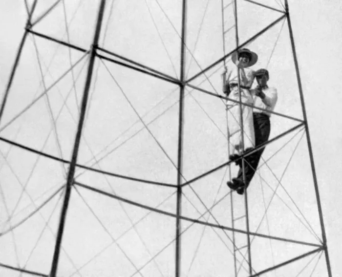 Framed Print : adolescent, adult, archival, black & white, boy, caucasian, climbing, electrical tower