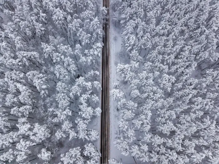 Framed Print : Aerial drone view of road in idyllic winter landscape