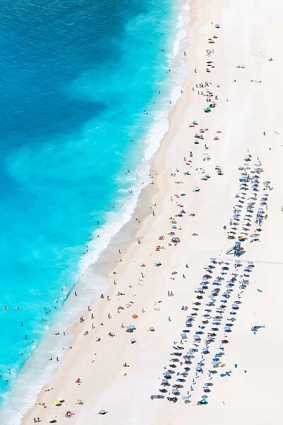 Aerial view of beach crowded with people in summer